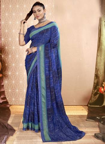 Attrective These Printed Designer Saree in Fine Colored.These Saree Are Chiffon And Blouse is Fabricated On Art Silk Pair.Its Beautified With Designer Printed With Swarovski Work Lace Border.