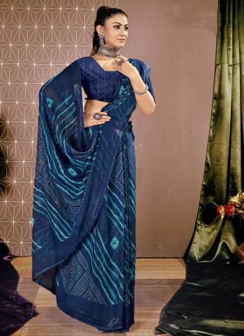 Attrective These Printed Designer Saree in Fine Colored.These Saree Are Chiffon And Blouse is Fabricated On Art Silk Pair.Its Beautified With Designer Printed.