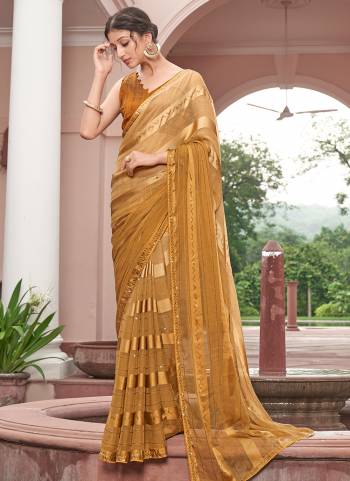 Garb These Designer Saree in Fine Colored.These Saree Are Chiffon And Blouse is Fabricated On Art Silk Pair.Its Beautified Peding Color,Wevon Satin Patta,Sequance Work.