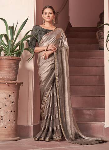 Garb These Designer Saree in Fine Colored.These Saree Are Chiffon And Blouse is Fabricated On Art Silk Pair.Its Beautified Peding Color,Wevon Satin Patta,Sequance Work.