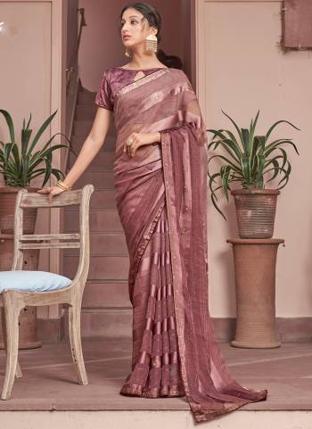 Garb These Designer Saree in Fine Colored.These Saree Are Chiffon And Blouse is Fabricated On Art Silk Pair.Its Beautified Peding Color,Wevon Satin Patta,Sequance Work.