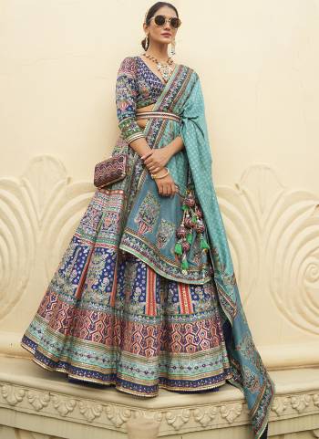 For A Fancy Designer Look,Grab These Lehenga Choli With Dupatta in Fine Colored.These Lehenga Are Rajwadi Silk And Choli Are Smooth Silk And Dupatta Are Fabricated On Rajwadi Silk Pair.Its Beautified With Designer Printed With Mirror Embroidery Work.