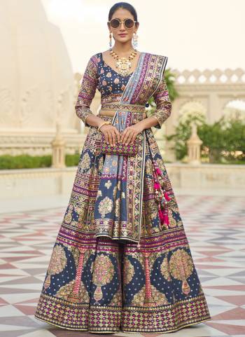 For A Fancy Designer Look,Grab These Lehenga Choli With Dupatta in Fine Colored.These Lehenga Are Rajwadi Silk And Choli Are Smooth Silk And Dupatta Are Fabricated On Rajwadi Silk Pair.Its Beautified With Designer Printed With Mirror Embroidery Work.