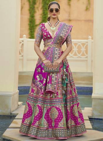 For A Fancy Designer Look,Grab These Lehenga Choli With Dupatta in Fine Colored.These Lehenga Are Rajwadi Silk And Choli Are Smooth Silk And Dupatta Are Fabricated On Rajwadi Silk Pair.Its Beautified With Designer Printed With Mirror Embroidery Work.