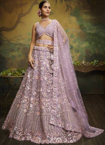 Attrective Looking This Partywear Fine Color Heavy Designer Choli Fabric Are Net And Lahenga Net And Dupatta Net In Fabricated Beautified With Attrective Thread,Sequance Embroidery Work. Buy Now.