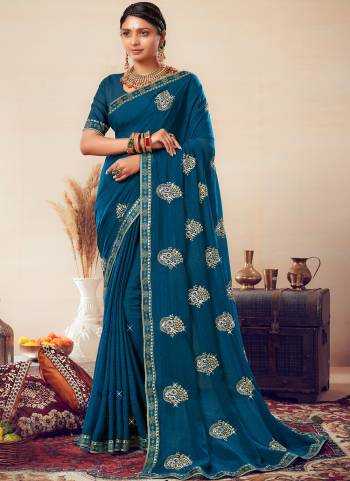 Garb These Saree in Fine Colored.These Saree Are Georgette And Blouse is Fabricated On Art Silk Pair.Its Beautified With Blooming Color With Jari Embroidery Work.