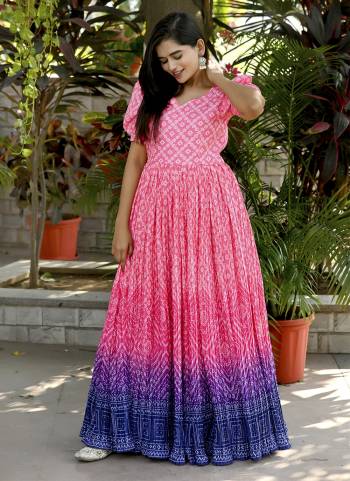 Attrective Looking These Beautiful Looking Readymade Gown.These Gown is Fabricated On Muslin Crochet.Its Beautified With Designer Bandhej Printed,Crush Pleating.