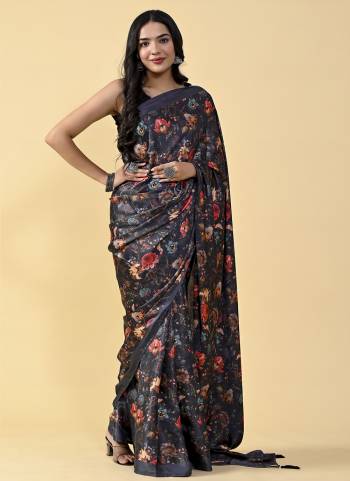 Garb This Partywear Saree Paired With Contrast Blouse.This Saree Are Satin Silk And Blouse Are Silk Based Fabric With Designer Digital Printed. Buy This Pretty Saree Now.