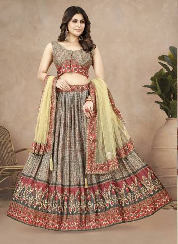 For A Designer Look,Grab These Lehenga Choli in Fine Colored.These Lehenga And Blouse Are Fabricated On Chinon Silk Pair With Net Dupatta.Its Beautified With Digital Printed With Crushed Work.