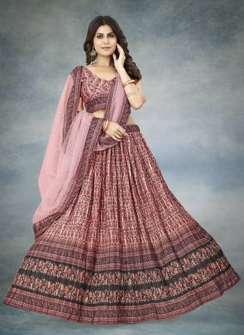 For A Designer Look,Grab These Lehenga Choli in Fine Colored.These Lehenga And Blouse Are Fabricated On Chinon Silk Pair With Net Dupatta.Its Beautified With Digital Printed With Crushed Work.