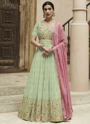 Garb These Designer Anarkali Suits in Fine Colored Pair With Dupatta.These Top Are Faux Georgette And Dupatta Are Fabricated On Faux Georgette Pair With Santoon Bottom.Its Beautified With Heavy Designer Embroidery Work.