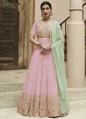 Garb These Designer Anarkali Suits in Fine Colored Pair With Dupatta.These Top Are Faux Georgette And Dupatta Are Fabricated On Faux Georgette Pair With Santoon Bottom.Its Beautified With Heavy Designer Embroidery Work.