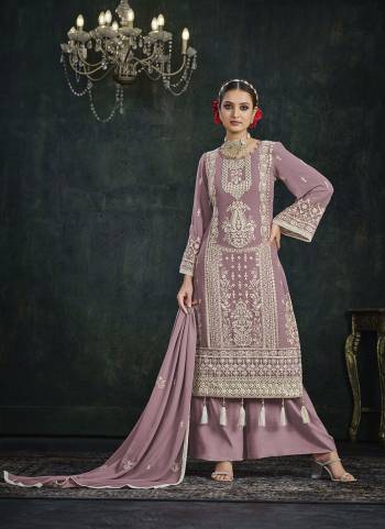 Grab These Plazzo Suit in Fine Colored Pair With Bottom And Dupatta.These Top And Dupatta Are Fabricated On Faux Georgette Pair With Santoon Bottom.Its Beautified With Santoon Inner.Its Beautified With Designer Heavy Embroidery Work.