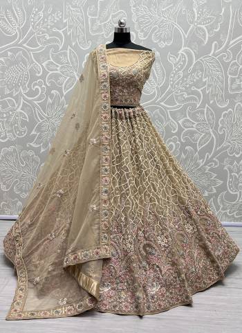 For A Fancy Designer Look,Grab These Lehenga Choli With Dupatta in Fine Colored.These Lehenga And Choli Are Bridal Net And Dupatta Are Fabricated On Soft Net Pair.Its Beautified With Designer Fancy Multy Thread,Sequance,Dori Embroidery,Diamond Work.