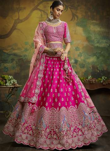 Attrective Looking This Partywear Fine Color Heavy Designer Choli Fabric Silk And Lahenga Silk And Dupatta Net In Fabricated Beautified With Attrective Thread,Sequance Embroidery,Stone And Beads Work. Buy Now.