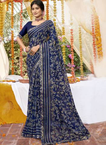 Garb These Printed Designer Saree in Fine Colored.These Saree Are Georgette And Blouse is Fabricated On Art Silk Pair.Its Beautified With Designer Printed With Lace Border.