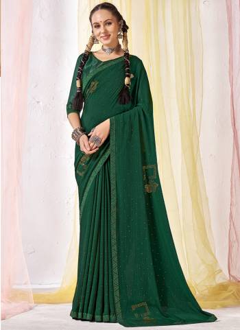 Garb These Designer Saree in Fine Colored.These Saree Are Blooming Zomato Chiffon And Blouse is Fabricated On Art Silk Pair.Its Beautified With Designer Swarovski Work.