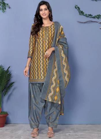 Grab These Suit in Fine Colored Pair With Bottom And Dupatta.These Top And Dupatta Are Fabricated On Cotton Pair With Cotton Bottom.Its Beautified With Designer Printed.