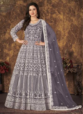 Grab These Beautiful Looking Designer Gown With Dupatta.Its Beautified With Designer Embroidery Work.