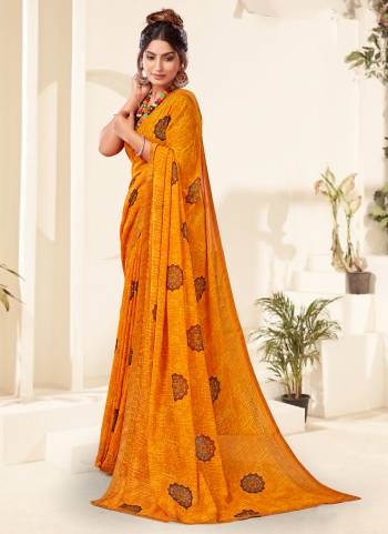 Attrective These Printed Designer Saree in Fine Colored.These Saree Are Georgette And Blouse is Fabricated On Georgette Pair.