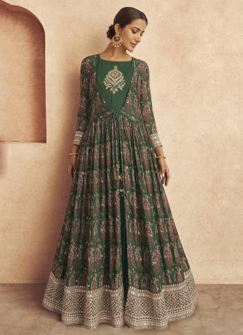 Grab the second look in this Green colored chinon Anarkali suit. this partywear stitched suit attire is beautifully adorned with printed jacket. this designer full sleeve suit comes along with Net dupatta which makes it appear more adorning. women can buy this ethnic dress to wear for their upcoming functions, receptions, engagement ceremony and family occasions, where you want to be the limelight. team it with ethnic accessories and heels to make your looks more beautiful.