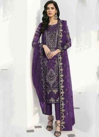 Purple colored suit is prettified with floral embroidered with sequins work as shown which makes it appear classy. This top is made of georgette fabric which is accompanied with santoon bottom, santoon lining and georgette dupatta. Women can buy this suit to wear for their parties and functions.