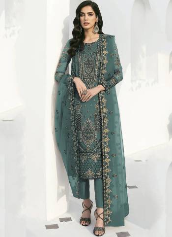 Green colored suit is prettified with floral embroidered with sequins work as shown which makes it appear classy. This top is made of georgette fabric which is accompanied with santoon bottom, santoon lining and georgette dupatta. Women can buy this suit to wear for their parties and functions.