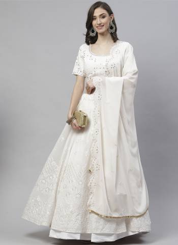 Bring out the true diva in you and reinvent your true self. All of this accenting the feminine beauty, with this White georgette designer lehenga choli. The embroidery sequence work looks chic and perfect for any occasion. Comes with matching choli and dupatta. (Slight variation in color, fabric & work is possible. Model images are only representative.)