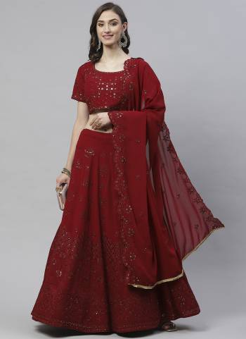 Bring out the true diva in you and reinvent your true self. All of this accenting the feminine beauty, with this Maroon georgette designer lehenga choli. The embroidery sequence work looks chic and perfect for any occasion. Comes with matching choli and dupatta. (Slight variation in color, fabric & work is possible. Model images are only representative.)