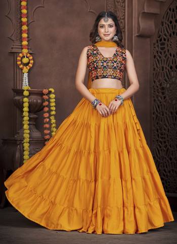 Grab These Navratri Special Lehenga Choli in Fine Colored.These Lehenga Are French Crepe And Choli Are Banglori Silk And Dupatta Are Fabricated On Chiffon Pair.Its Beautified With Designer Thread,Mirror Embroidery Work.