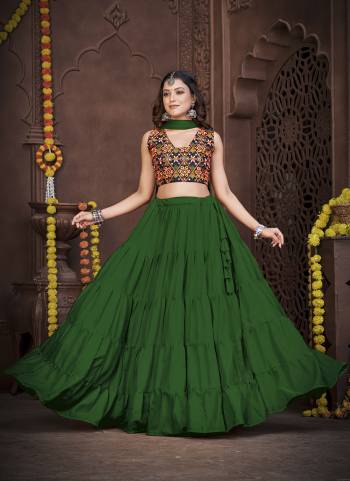 Grab These Navratri Special Lehenga Choli in Fine Colored.These Lehenga Are French Crepe And Choli Are Banglori Silk And Dupatta Are Fabricated On Chiffon Pair.Its Beautified With Designer Thread,Mirror Embroidery Work.