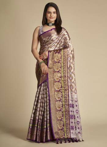 Garb This Partywear Saree Paired With Blouse In Fine Color.This Saree And Blouse Are Tissue Silk Based Fabric With Weaving Jacquard Designer. Buy This Pretty Saree Now.