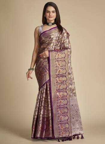 Garb This Partywear Saree Paired With Blouse In Fine Color.This Saree And Blouse Are Tissue Silk Based Fabric With Weaving Jacquard Designer. Buy This Pretty Saree Now.