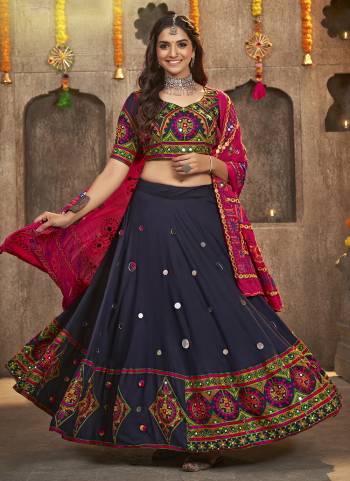 Grab These Navratri Special Lehenga Choli in Fine Colored.These Lehenga And Blouse Are Viscose Rayon And Dupatta Are Fabricated On Cotton.Its Beautified With Printed,Heavy Mirror,Thread Embroidery Work.