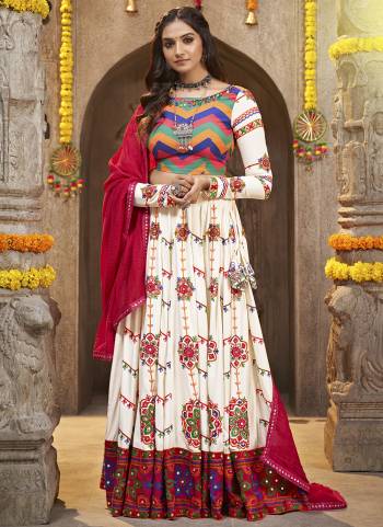 Grab These Navratri Special Lehenga Choli in Fine Colored.These Lehenga And Blouse Are Viscose Rayon And Dupatta Are Fabricated On Cotton.Its Beautified With Crushed,Heavy Mirror,Thread Embroidery Work.