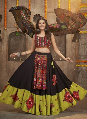 Grab These Navratri Special Lehenga Choli in Fine Colored.These Lehenga And Blouse Are Viscose Rayon And Dupatta Are Fabricated On Cotton.Its Beautified With Printed,Heavy Mirror,Thread Embroidery Work.