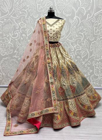 For A Fancy Designer Look,Grab These Lehenga Choli With Dupatta in Fine Colored.These Lehenga And Choli Are Silk And Dupatta Are Fabricated On Soft Net Pair.Its Beautified With Designer Fancy Multy Thread,Sequance,Dori Embroidery,Diamond Work.