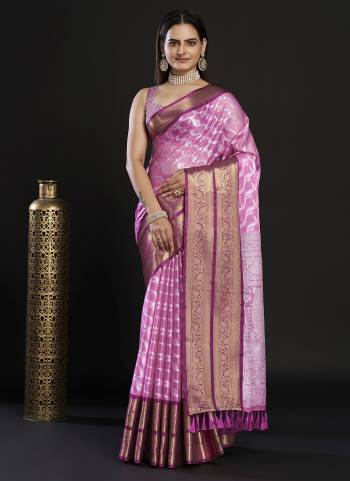 Garb This Partywear Saree Paired With Blouse In Fine Color.This Saree And Blouse Are Kanjivaram Silk Based Fabric With Weaving Jacquard Designer. Buy This Pretty Saree Now.