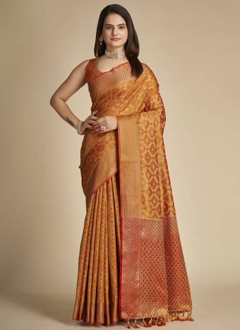 Garb This Partywear Saree Paired With Blouse In Fine Color.This Saree And Blouse Are Patola Silk Based Fabric With Weaving Banarasi Designer. Buy This Pretty Saree Now.