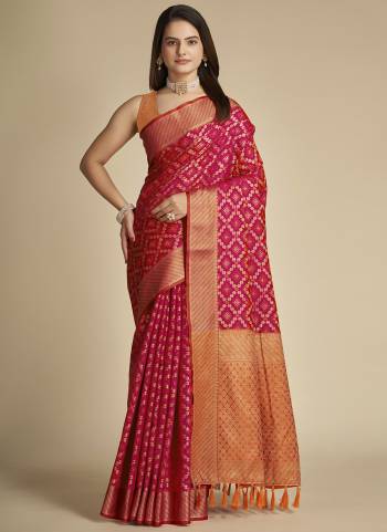 Garb This Partywear Saree Paired With Blouse In Fine Color.This Saree And Blouse Are Patola Silk Based Fabric With Weaving Banarasi Designer. Buy This Pretty Saree Now.