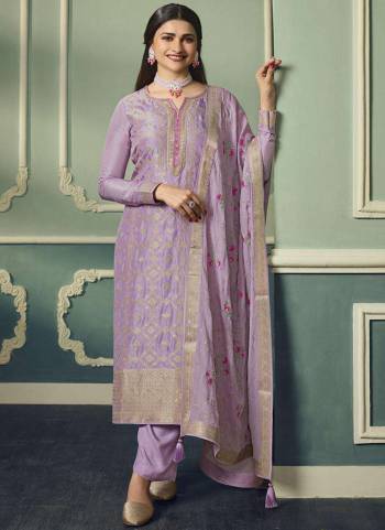 Attrective These Designer Suit in Fine Colored Pair With Bottom And Dupatta.These Top Are Viscose Jacquard And Dupatta Are Fabricated On Rangoli Silk Pair With Santoon Bottom.Its Beautified With Santoon Inner.Its Beautified With Heavy Wevon Jari Designer With  Embroidery Work.