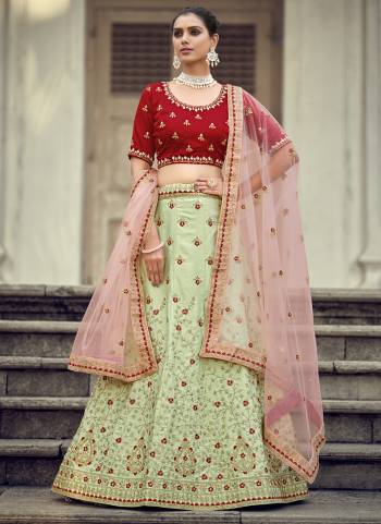 Garb This Partywear Fine Color Heavy Designer Lehemga Choli Fabric Are Malai Satin And And Dupatta Soft Net In Fabricated Beautified With Attrective Embroidery,Diamond Stone Work. Buy Now.