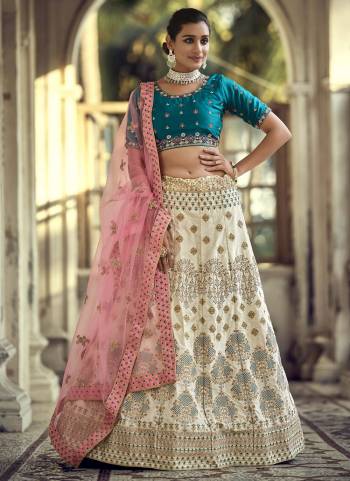 Garb This Partywear Fine Color Heavy Designer Lehemga Choli Fabric Are Malai Satin And And Dupatta Soft Net In Fabricated Beautified With Attrective Embroidery,Diamond Stone Work. Buy Now.