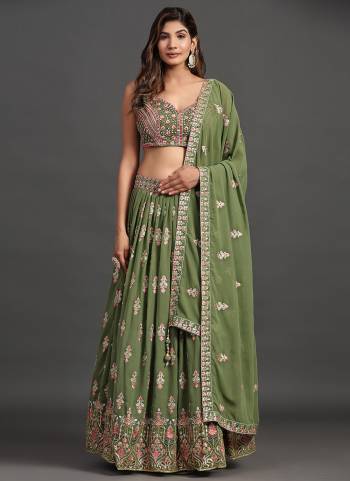 For A Designer Look,Grab These Lehenga Choli in Fine Colored.These Lehenga And Blouse Are Fabricated On Georgette Pair With Georgette Dupatta.Its Beautified With Designer Sequance,Thread,Mirror Embroidery Work.