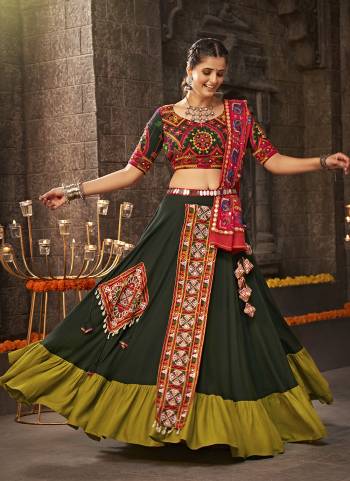 Attrective These Navratri Special Lehenga Choli in Fine Colored.These Lehenga Are Viscose Rayon And Blouse Are Viscoce Rayon And Dupatta Are Fabricated On Cotton.Its Beautified With Heavy Mirror,Thread Embroidery Work.