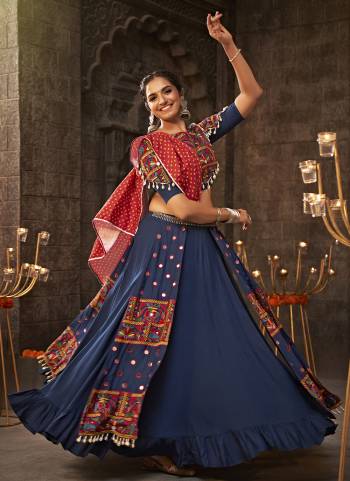 Attrective These Navratri Special Lehenga Choli in Fine Colored.These Lehenga Are Viscose Rayon And Blouse Are Viscoce Rayon And Dupatta Are Fabricated On Rayon.Its Beautified With Heavy Mirror,Thread Embroidery Work.