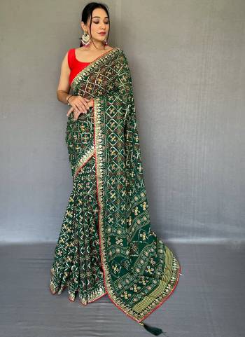 Garb These Party Wear Saree With Blouse in Fine Colored.These Saree And Blouse is Fabricated On Georgette.Its Beautified With Bandhani Printed With Gotta Pata Lace Border Bolose.