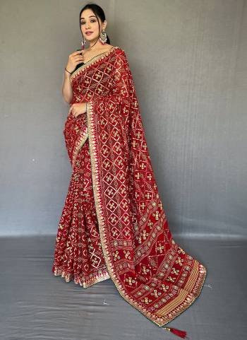 Garb These Party Wear Saree With Blouse in Fine Colored.These Saree And Blouse is Fabricated On Georgette.Its Beautified With Bandhani Printed With Gotta Pata Lace Border Bolose.