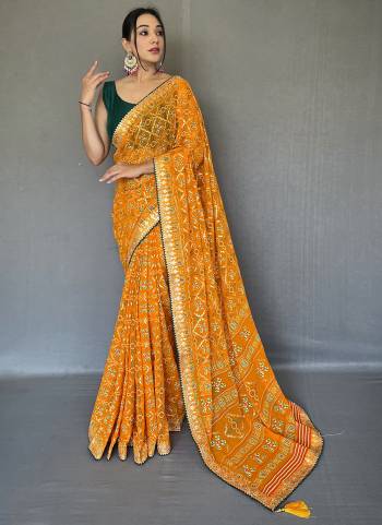 Garb These Party Wear Saree With Blouse in Fine Colored.These Saree And Blouse is Fabricated On Georgette.Its Beautified With Bandhani Printed With Gotta Pata Lace Border Bolose.