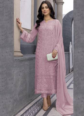 Attrective These Designer Suit in Fine Colored Pair With Bottom And Dupatta.These Top And Dupatta Are Fabricated On Faux Georgette Pair With Santoon Bottom.Its Beautified With Santoon Inner.Its Beautified With Designer Floral Embroidery Work.